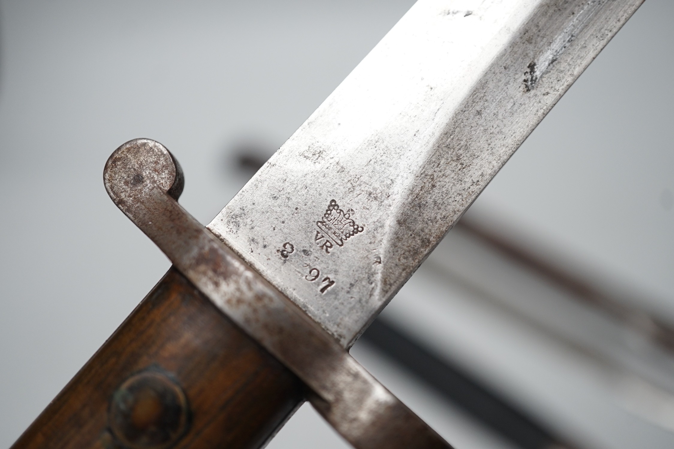 A 19th century British bayonet and scabbard together with a German bayonet and scabbard, the blade stamped Gottlieb Hammesfahr Solingen Foche